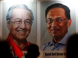 Mahathir, set a retirement date or we'll do it for you: Anwar ally Rafizi 