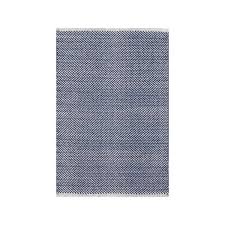 This blue rug has a light gray geometric design with diamonds and arrowheads for a pop of pattern underfoot. Herringbone Chevron Handwoven Cotton Indigo Area Rug Dash And Albert Rugs Geometric Area Rug Area Rugs