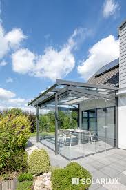Dieses Terrassendach Wird Mit Einer Senkrechten Verglasung Zu Einem Glashaus Sicher Gegen Wind Und Regen Terrassendach Uberdachung Terrasse Glashaus