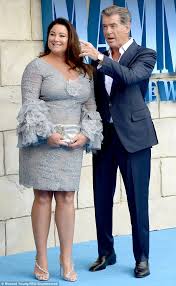 Brosnan was married for the first time in december 1970 to his first wife, cassandra harris. Pierce Brosnan Leads His Wife Into Mamma Mia Premiere In London Daily Mail Online