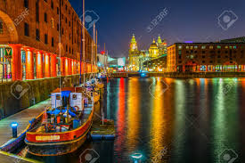 Liverpool is a city in north west england, united kingdom with a population of about 485,000 in 2015. Night View Of Illuminated Albert Dock In Liverpool England Stock Photo Picture And Royalty Free Image Image 102250193
