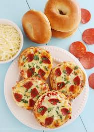 Easy Mini Bagel Pizzas Recipe Mini Bagels Pizza Bagels Mini Bagel Pizza