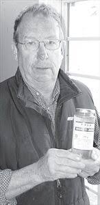 Busy as a beekeeper; Arnold Polk and his bees follow similar flights:  simple needs, hard work and some timeless truths