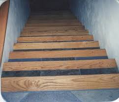 Our stair tread products are made of aluminum, and may include supplemental materials such as epoxy. Wood Stair Treads Tile Inlay Kendall S Custom Wood Floors Inc Red Oak And Slate Tile Slate Tile Red Oak Hardwood Red Oak Hardwood Floors