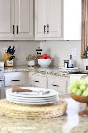 The idea is to make this taupe shade the center of attention in your kitchen. Diy Painted Oak Kitchen Cabinets Makeover Average But Inspired