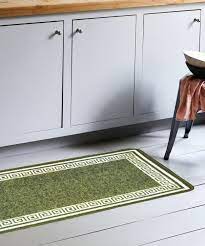The elegant contemporary pattern featured on this gorgeous rug showcases rich colors like sage and beige 17 Green Kitchen Rug Design Ideas That Will Freshen Up Space