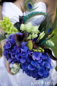 Women deserted the former constricting and modest clothing of former years and developed a style of their own. Peacock Feather Bouquets 1920s Flowers Deco Weddings