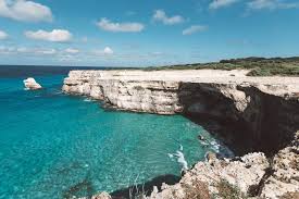 Fronting both the adriatic and ionian seas, its blue and green waters are blissfully warm, and it offers sandy beaches as well as rugged prehistoric coves and romantic grottoes, towns with ancient. Top 10 Beaches In Puglia Italy Ultimate Guide To The Best Puglia Beaches
