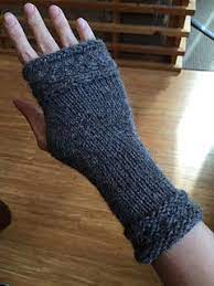 Do you have trouble getting kids to wear gloves? Fitted Fingerless Mitts Wrapped With A Cable Fingerless Mitts Fingerless Gloves Knitting Gloves Pattern