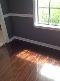 Seal Gray Paint With White Trim And Dark Laminate Floor Love The Combination White Baseboards Grey Laminate Flooring Dark Laminate Floors