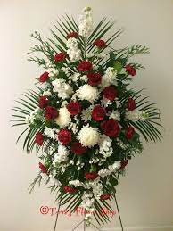 Red and white flowers funeral. Red And White Funeral Easel By Terri S Flower Shop Funeral Floral Arrangements White Flower Arrangements Funeral Floral