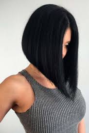 4k00:07young woman in a shirt meets the morning on the balcony, daily routine. 21 Beautiful Brunette Bob Hair Cut For Your Trendy Look My Stylish Zoo