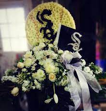 Free delivery to all funeral homes on all items over $69.00. Sox Baseball Casket Cover Standing Spray Combo Florals By Steen