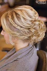Another 25 Bridal Hairstyles Wedding Updos Confetti Daydreams An Updo With Wisps Of Curly Hair Pulled Back Into A Low Hair Styles Wedding Hairstyles Hair
