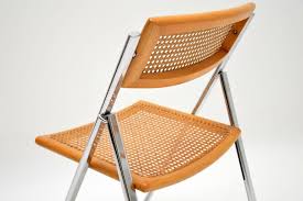High quality heavy duty durable metal framed folding chair with zero gravity positionning specifications dimensions: 1970s Italian Chrome And Cane Folding Dining Chairs By Arben At 1stdibs