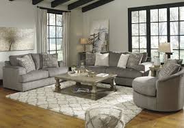 Faux leather couches are a great choice for a refined yet cozy space. Soletren Ash Living Room Set From Ashley Coleman Furniture