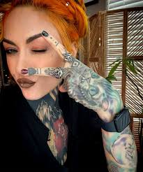 Name: Lena Scissorhands Role: Vocalist & Composer Band: Infected Rain  Country: Moldova