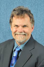 San Diego Municipal Employees Association In the midst of a storm, MEA  Executive Board Member Bill Craig locates his sight to be