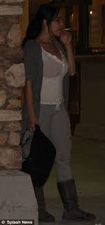 Nadya 'Octomom' Suleman puffs on a cigarette after rehab treatment ...