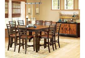 Grab a seat and gather around for an evening with friends, dinner with the kids, or a rousing game night with the family. Abaco 5 Piece Gathering Table Set 54 Square Leg Table Ladder Back Stools Sadler S Home Furnishings Pub Table And Stool Sets
