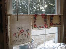 hanging vintage kitchen towels across a
