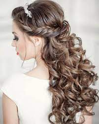 But if you lack length or want to wear your hair up to show off your delicate neckline and shoulders, try one of soft curly updos with flowers, loose braids, twists or dainty hair pieces. Essential Guide To Wedding Hairstyles For Long Hair