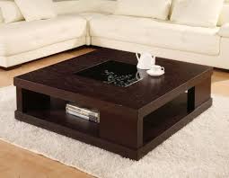 A coffee table with storage is an essential furniture piece. 15 Captivating Modern Coffee Tables With Storage Table Decor Living Room Living Room Table Sets Center Table Living Room