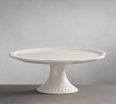 White enameled cake stand with metallic edge (2 colors). Emma Beaded Stoneware Cake Stand Cake Stand Ceramic Pottery Pottery Barn