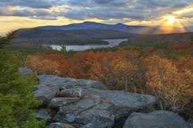 Obstruction at the entrance to a cave ▪ the huge boulders of the breakwater loomed ahead of him, the grey stone showing white in the. Catskill Mountains Definition And Meaning Collins English Dictionary