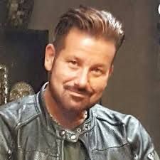 Travaglio's Salon , owner