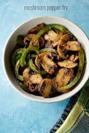 Mushroom Pepper Fry Recipe With Step By Step Photos Spicy And Tasty Recipe Of Mushroom In 2020 Mushroom Recipes Indian Stuffed Peppers Indian Food Recipes Vegetarian