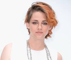 Add a few highlights to make your curls pop. Kristen Stewart S Short Haircut New Copper Coloured Crop At Chanel