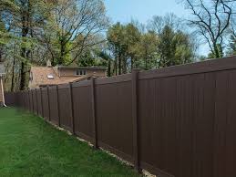 2 rail vinyl fencing is a wonderful way to mark a property line, define a space, or accent your yard. 6 Tall Dark Walnut Vinyl Privacy Fence