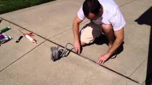 Expansion joint — an opening or gap between adjacent parts of a building structure or concrete work which allows for safe and inconsequential relative expansion joint filler — a compressible material used to fill a joint to prevent the infiltration of debris and to provide support for sealants. Diy Repair Driveway Expansion Joints Youtube