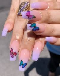 Butterfly nails are lovely to take a gander at. Nails By Nailsby Jennn Using Our Butterfly Naildecals Shop Decals Nailedbycr Acrylicnails Beaut Purple Ombre Nails Coffin Nails Designs Nail Art Ombre