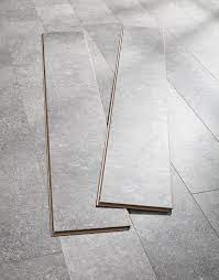 Laminate tile looks like the real thing without the problems associated with real grout. Valencia Tile Weathered Grey Laminate Flooring Direct Wood Flooring