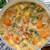 Slow cooker, combine potatoes, carrots, celery, onion, corn and meatballs. 1