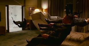 A man runs through a crumbling building shooting several attackers in the beginning. The Neuroscience Of Inception Wired