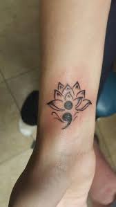 The purple lotus flower tattoo is usually associated with buddhism, and is intended to represent a mystical view of spirituality. Lotus Flower Tattoo Meaning Mental Health Novocom Top