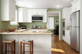 Wood, stainless steel kitchen cabinets range widely from $100 to $1,200 per linear foot. How Much Do Kitchen Cabinets Cost Cabinetselect Com