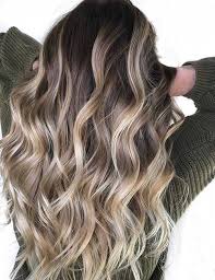 Brown hair with some highlights in a braid. 40 Eye Catching Blonde Highlights For Brown Hair Bronde Hairstyles