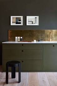 The color offers refreshing contrast against dark wood floors and echoes the view outside the window to brighten the space. Trend Alert 10 Favorite Time Tested Dark Green Kitchens Remodelista