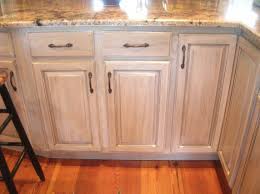 Then, using a fresh rag, wipe with the grain to remove the excess and expose the grain. Pickled Oak Stained Kitchen Cabinets Honey Oak Cabinets Oak Kitchen Cabinets