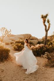 If it rains on your photo shoot, use the weather in your favor to create a unique photo. Joshua Tree Bridal Session