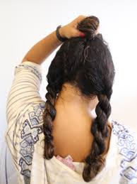 I tend to get caught up in a routine of just putting my hair up in a ponytail or wearing it wavy and loose, but in side braids are joined by one back braid into a bun, with side hair then twisted and wrapped. How To Braid Curly Hair Devacurl Blog