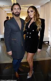 Tamara Ecclestone cradles her daughter Serena as she enjoys country outing  with husband Jay Rutland