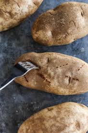 Roast, stirring once halfway through cooking, until potatoes are golden brown and crisp. Easy Baked Potato Recipe In The Oven Microwave Air Fryer Grill