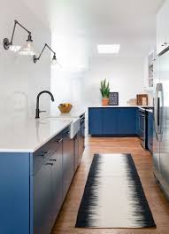 Check spelling or type a new query. This Home Received An Updated Kitchen With Blue Cabinets And White Countertops