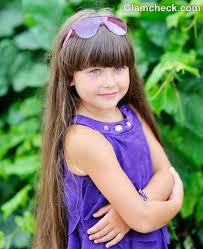For natural black hair on little girls, start with cornrows. Styling Ideas For Little Girls With Long Hair And Bangs Girl Haircuts Long Hair Girl Long Hair Styles