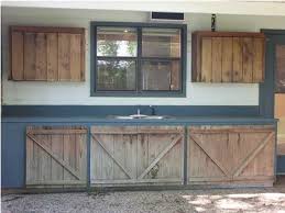 Outdoor Kitchen Cabinets Made With Fence Boards Outdoor Kitchen Cabinets Log Cabin Kitchens Outdoor Kitchen